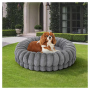 BALANCE lit donut en gris vu de face, design rond et accueillant bénéfique pour le repos