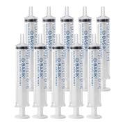 BASIK seringue 5cc face montrant graduations et capuchon, précision de dosage
