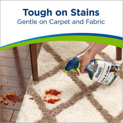 Bissell Woolite en cours d'application sur une tache de vin sur tapis — élimination visible