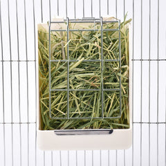 CalPalmy distributeur installé dans cage avec lapin pour réduire gaspillage
