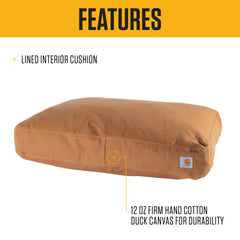Carhartt gros plan toile duck 12 oz montrant texture résistante et déperlante