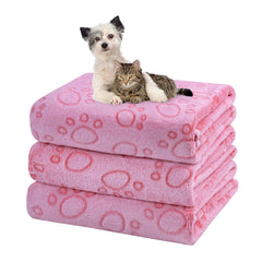 Dono plaid face avant montrant motif pattes et protection du mobilier