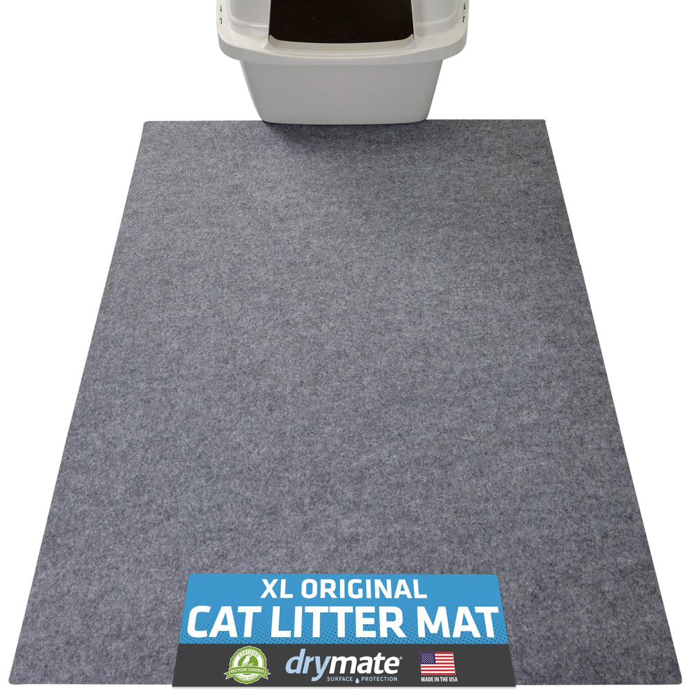 Drymate vue avant du tapis avec emballage, protège le sol efficacement