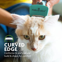 FURminator bouton FURejector prêt à éjecter les poils pour nettoyage facile