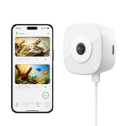 HomiQ face avant collée sur vitre montrant design compact et surveillance claire