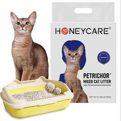HONEY CARE texture litière dans la main illustrant agglutination rapide