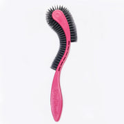 KittyWand brosse face avant montrant la forme ergonomique et confort