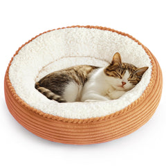 Love's cabin vue frontale du lit donut orange rayé offrant confort visuel