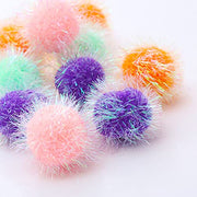 Osvela pack de 12 pompons colorés montrant l'emballage pratique et varié