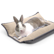 Paw Inspired lit avant montrant le coussin réversible et un bord protecteur