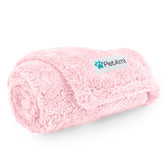 PetAmi couverture rose pliée montrant compacité et protection