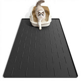 Pieviev tapis litière face avant montrant capture de grains et protection du sol