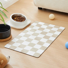 Ralxion tapis devant emballage montrant design damier et protection des sols