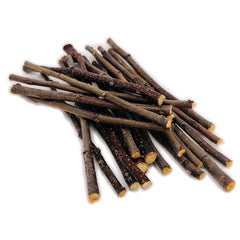 TAI JI gros plan sur texture bois de branche offrant usure dentaire