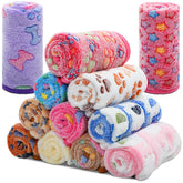 Tatuo vue frontale du lot de plaids montrant couleurs et motifs, protection immédiate