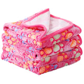 Tatuo plaid face avant montrant motif patte et protection mobilier