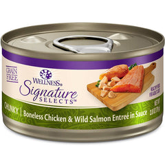 Boîte saumon ouverte Wellness révélant flocons en sauce