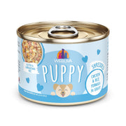 Weruva puppy pot au premier plan montrant l'étiquette claire et bénéfice nutritif