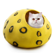 Woolygon cave frontale cheetah montrant l'entrée confortable et protectrice
