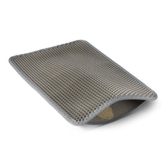 Amazon Basics tapis litière face avant montrant capture des grains