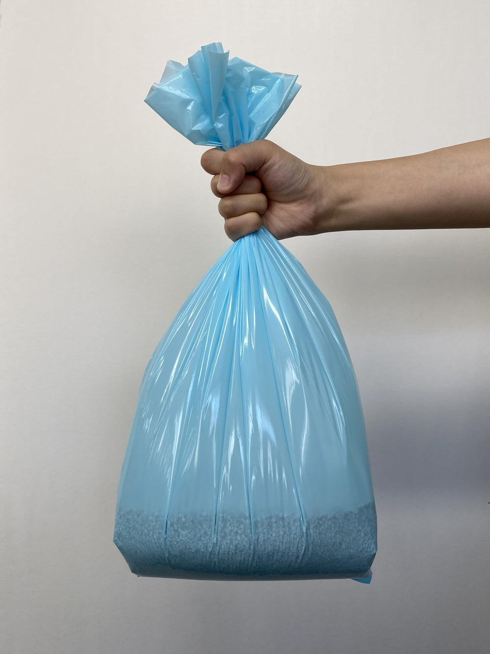 BOS sac en usage pour vider un bac à litière proprement