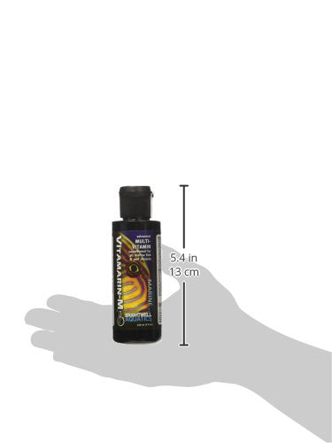 Brightwell Aquatics produit Vitamarin‑M en scène d'aquarium récifal pour couleur