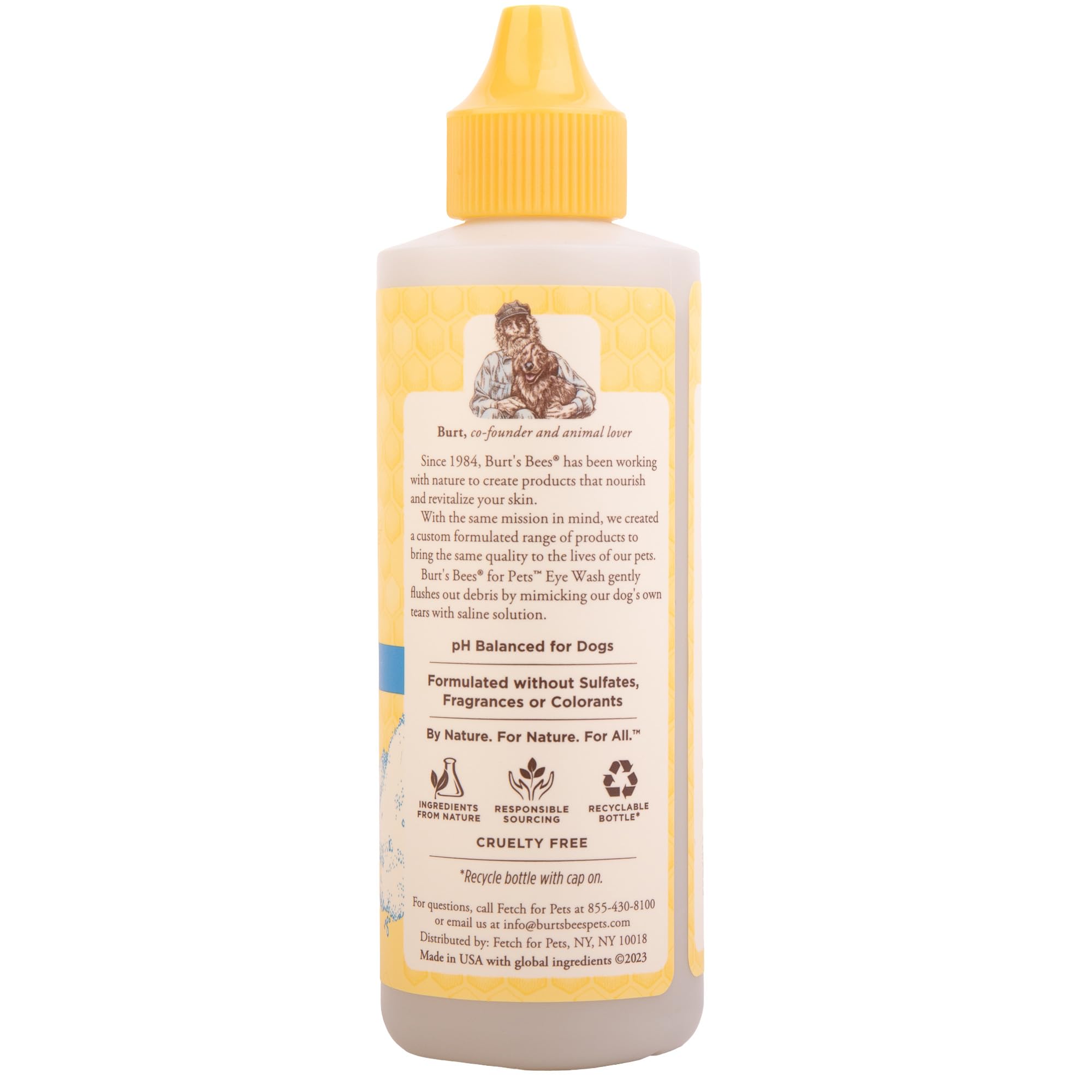 BURT'S BEES FOR PETS flacon à côté d'une règle pour échelle