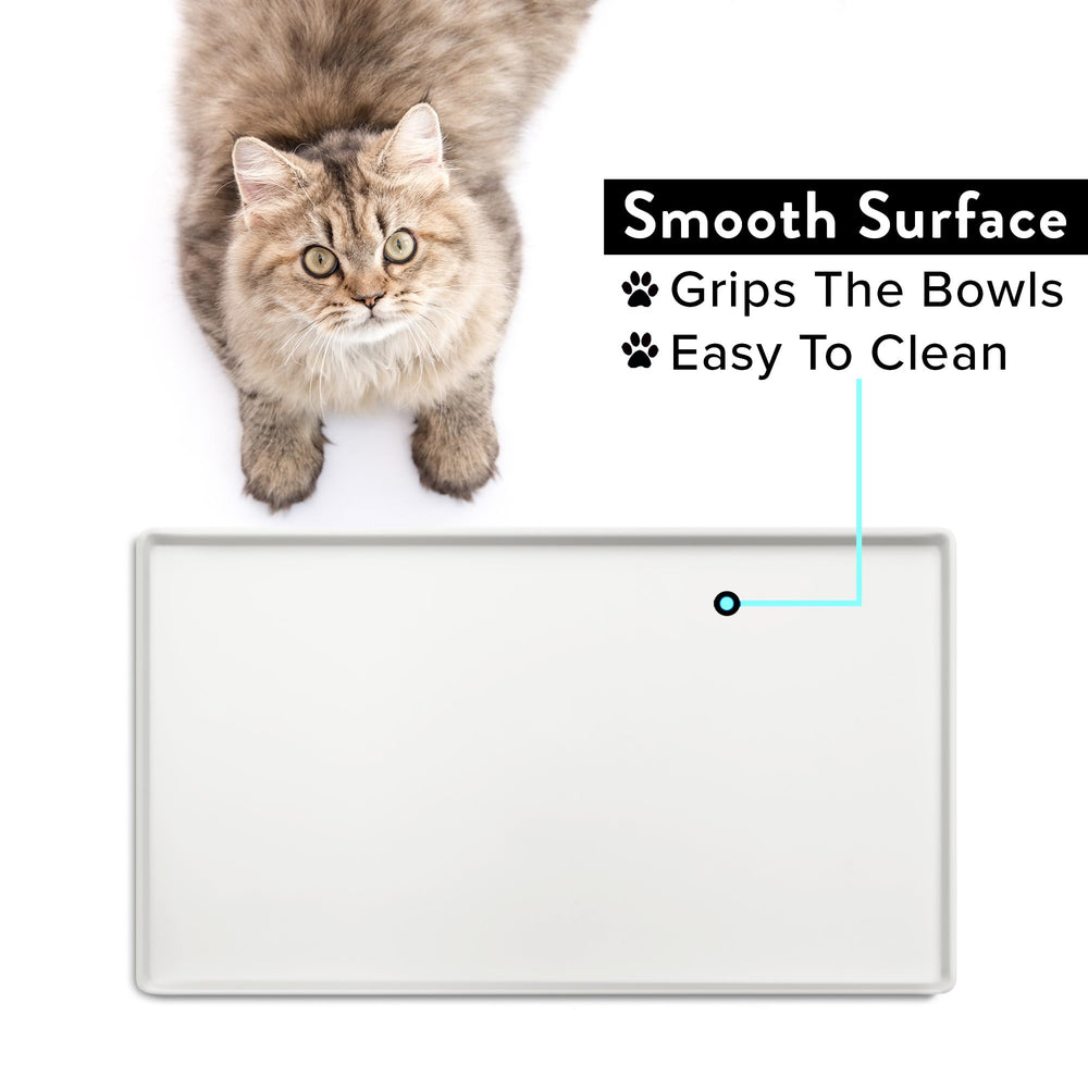 CatGuru tapis en usage avec gamelles réduit éclaboussures et désordre
