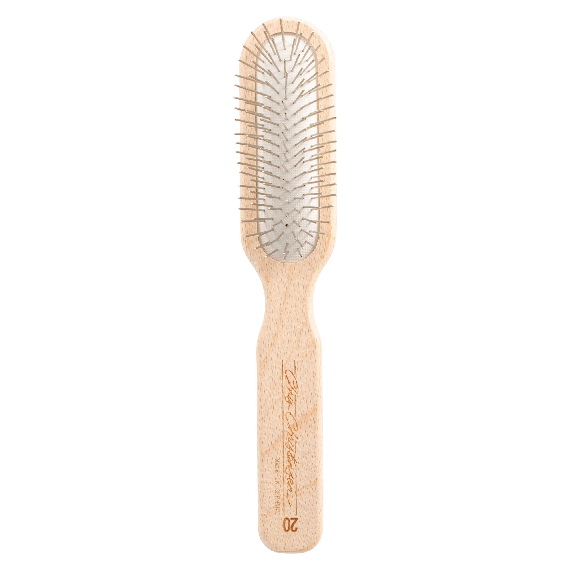 Chris Christensen brosse oblong face montrant tête et picots, résultat professionnel