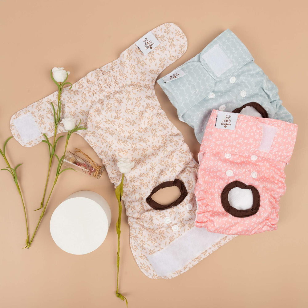 CuteBone ruban-mesure près d'une couche illustrant choix de la taille adaptée
