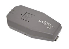 Dazzer Dog Dazer II posé à côté d'un objet courant pour comparaison d'échelle et portabilité