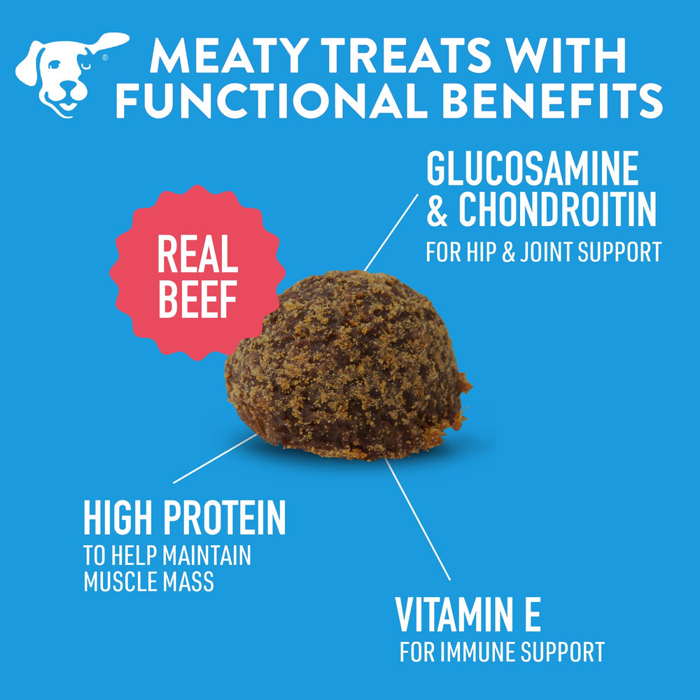 Meatball DOGSWELL près d'une patte de chien pour comparer taille et portion