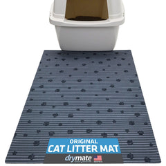 Drymate tapis devant bac montrant capture de litière et sol propre