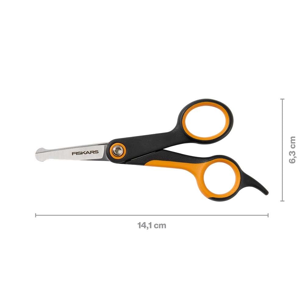 Fiskars ciseaux en usage sur chat pour finitions délicates