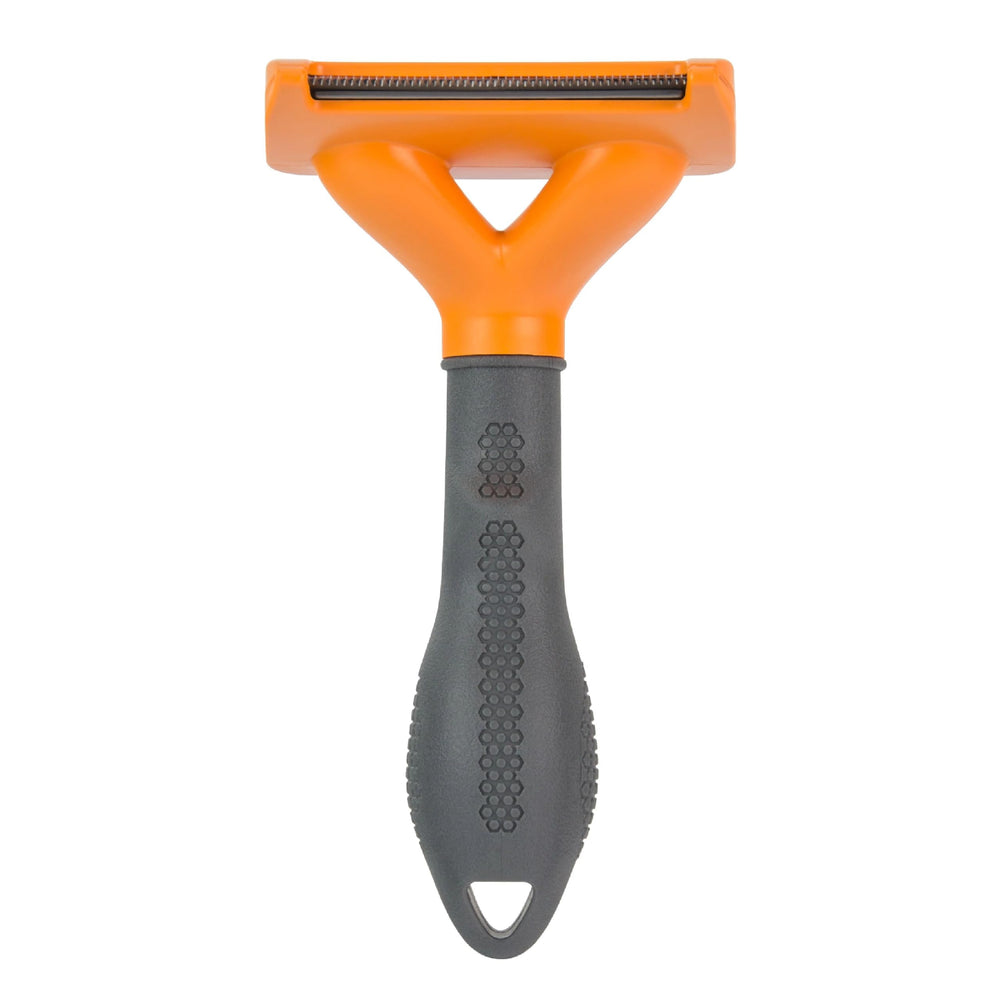 FURminator bouton FURejector en détail pour éjection rapide des poils