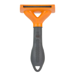 FURminator bouton FURejector en détail pour éjection rapide des poils