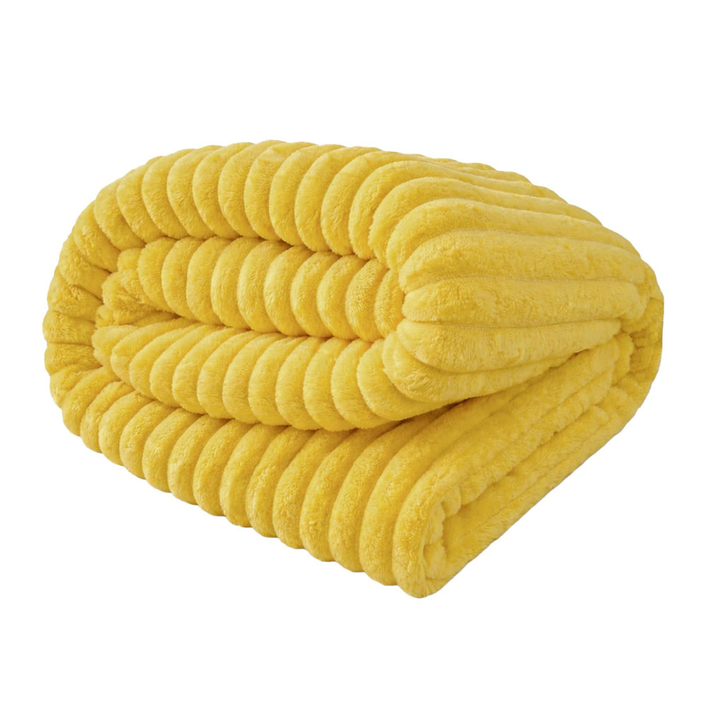 Generic couverture jaune pliée montrant gain de place et confort