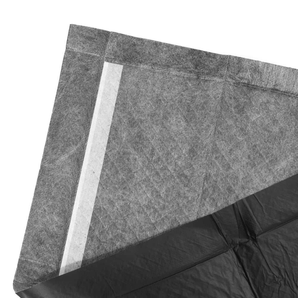 Glad tapis posé dans une caisse standard illustrant usage en voyage