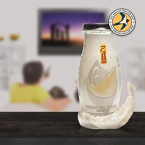 Golden Nest flacon en main illustrant le format 240 ml pratique et nomade