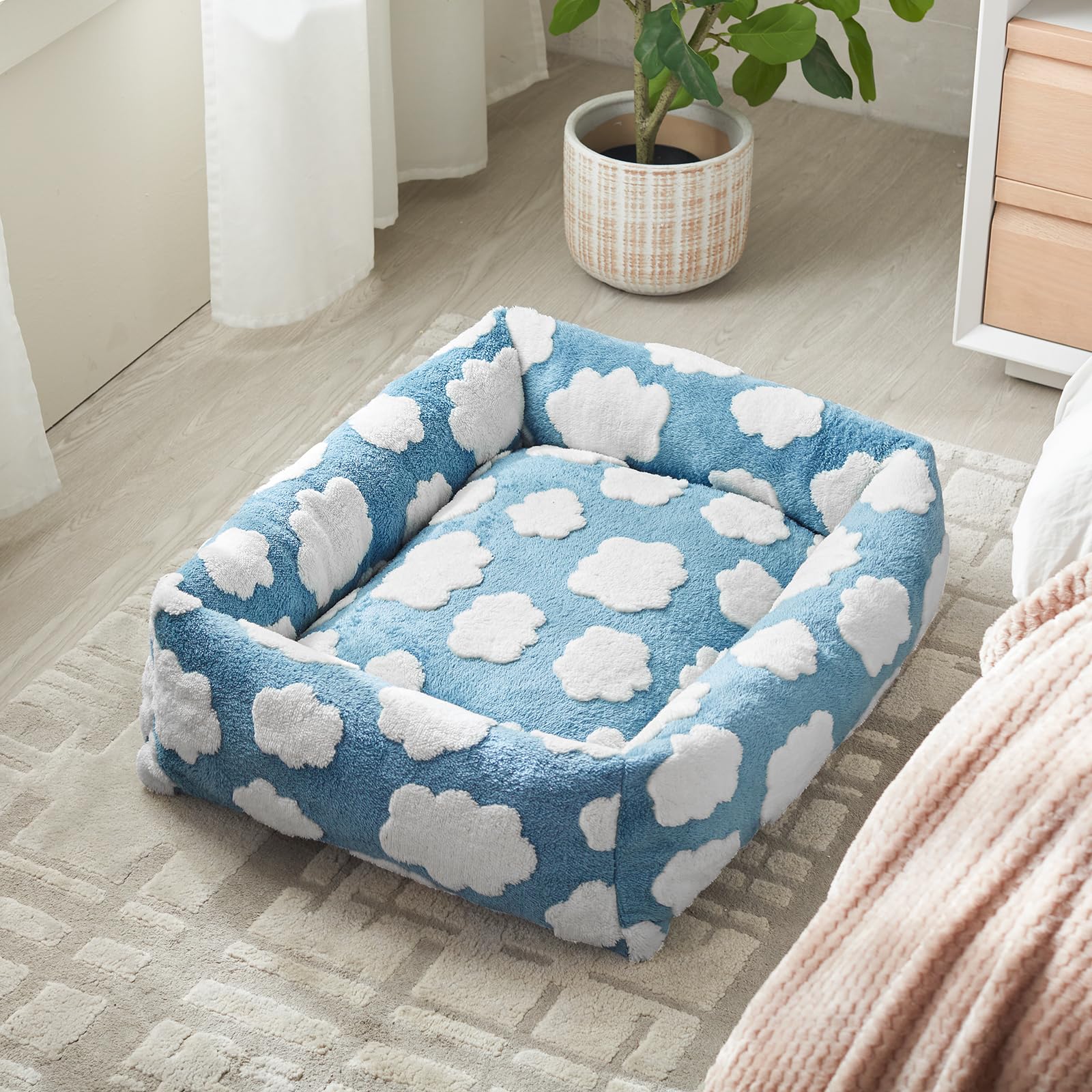 JOEJOY lit en lifestyle sur canapé améliorant esthétique d’intérieur