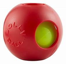 Jolly Pets Teaser Ball proche d'une patte pour comparer la taille, adapté petits chiens