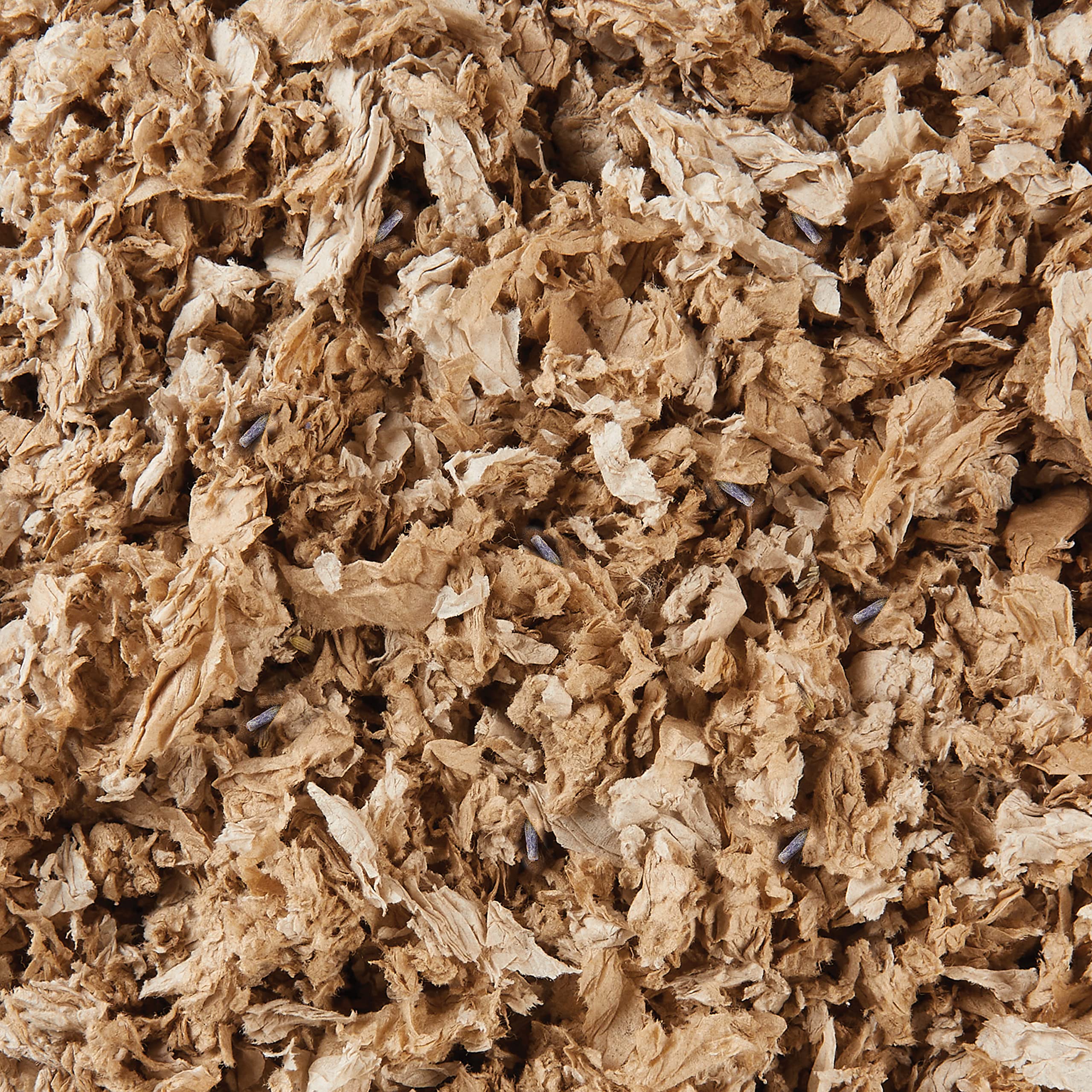 Kaytee gros plan texture papier moelleux montrant confort et absorption élevée