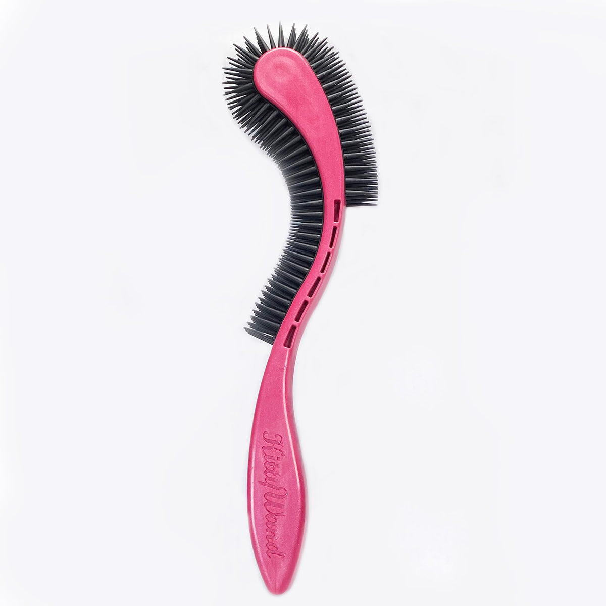 KittyWand brosse face avant montrant la forme ergonomique et confort