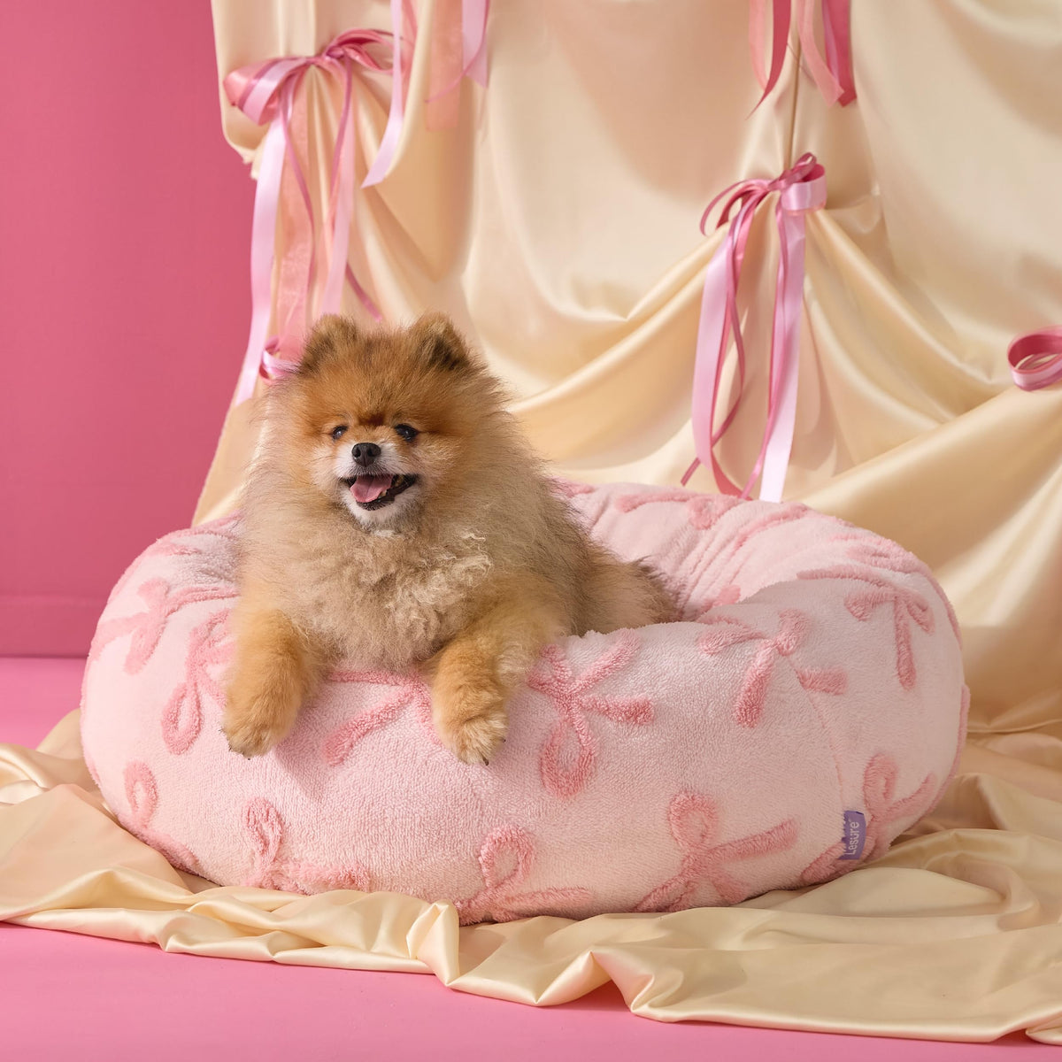 LE SURE packaging du lit donut rose montrant le produit et l'emballage avantageux