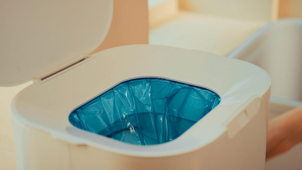 Gros plan matière Litter Zero montrant la structure 7 couches et la résistance