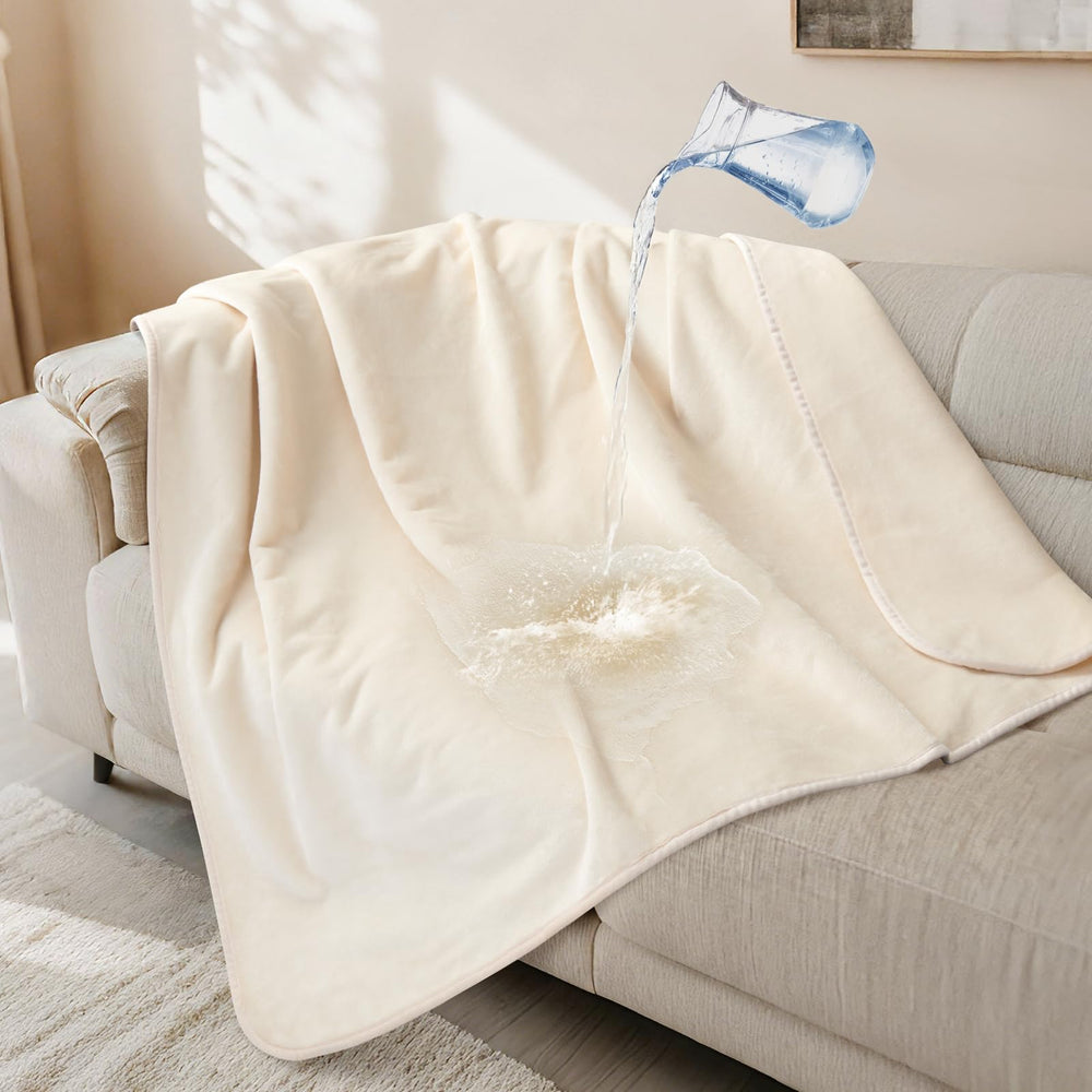 LOOBANI couverture face avant beige protégeant canapé et décor