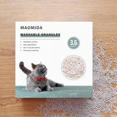Gros plan des granulés MAOMIDA illustrant la texture douce pour pattes et le confort du chat