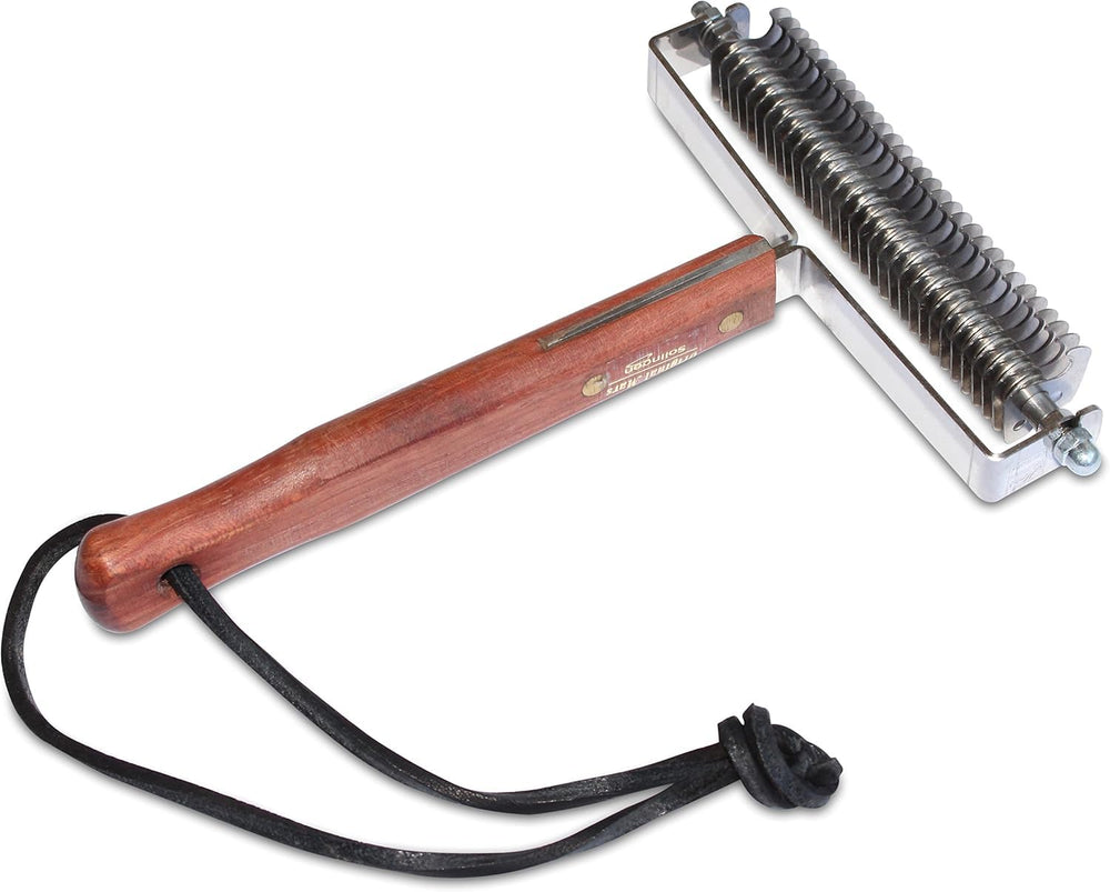 Mars Coat King gros plan lames inox 30 dents, efficacité d'extraction