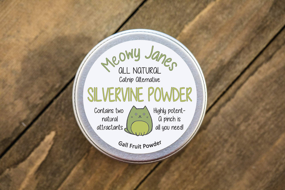 Meowy Janes poudre dans la main indiquant le contrôle du dosage et l'usage pratique