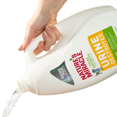 Nature's Miracle étiquette en gros plan montrant la formule enzymatique et instructions utiles